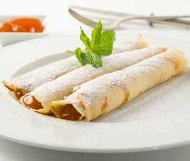 Crepe filled with Apricot jam and topped with powdered sugar 